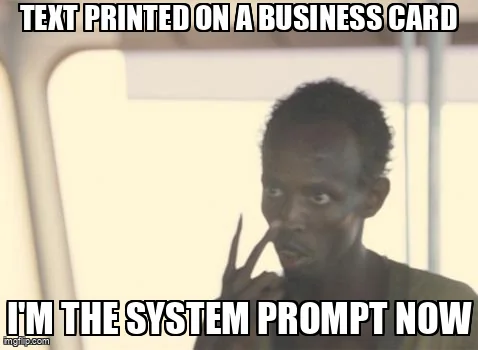 I'm the Captain Now meme: "Text printed on a business card": "I'm the system prompt now".